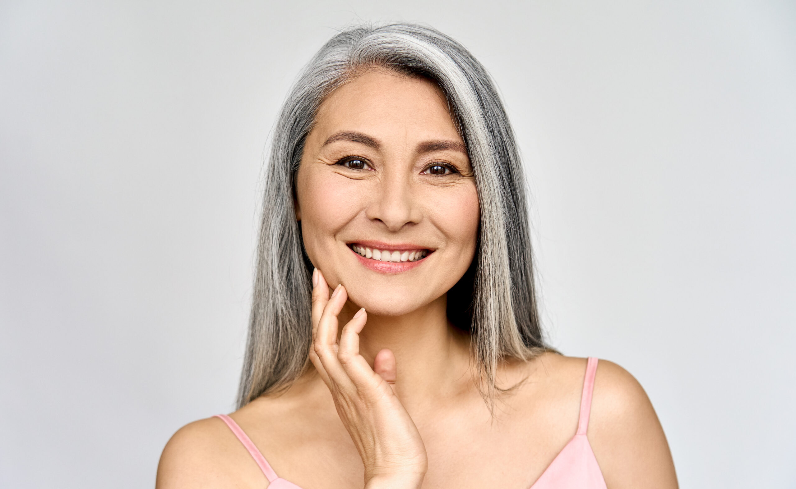 Senior happy middle aged mature asian woman portrait. Skin care advertising.